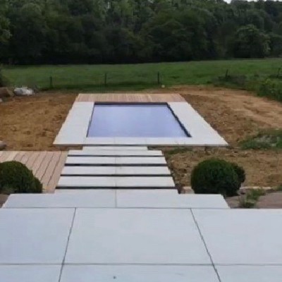 Réalisation d'une piscine dans un jardin à Bois de Villers